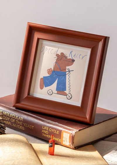 Classic wooden picture frame with an image of illustrated fruits.