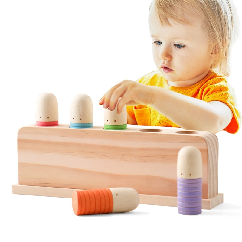 Hochwertiges Hüpfspielzeug aus Kiefernholz, das die Farberkennung trainiert und die visuelle sensorische Entwicklung von Montessori fördert